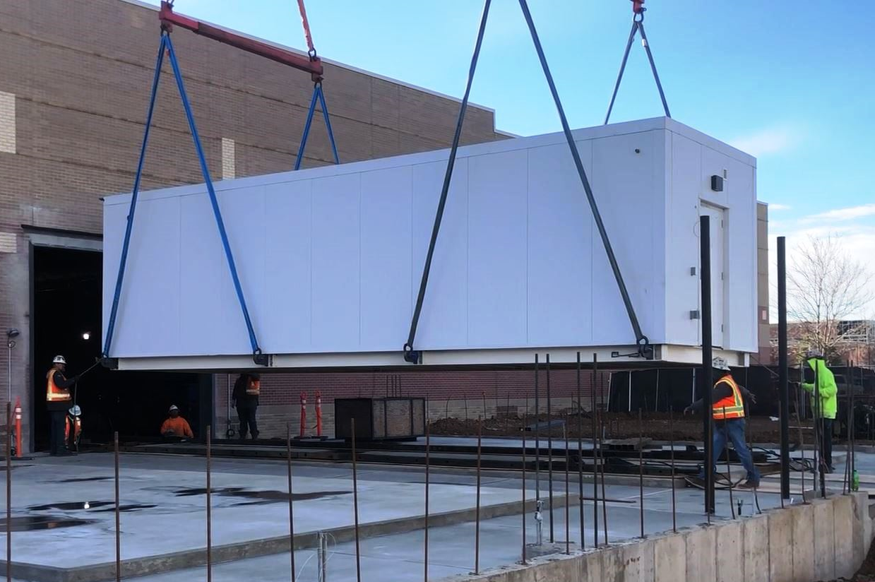 Data center container lowered into place